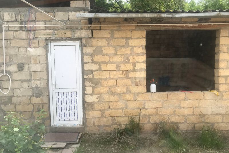 063 The Toilet and Washroom Outside in the Back.jpg