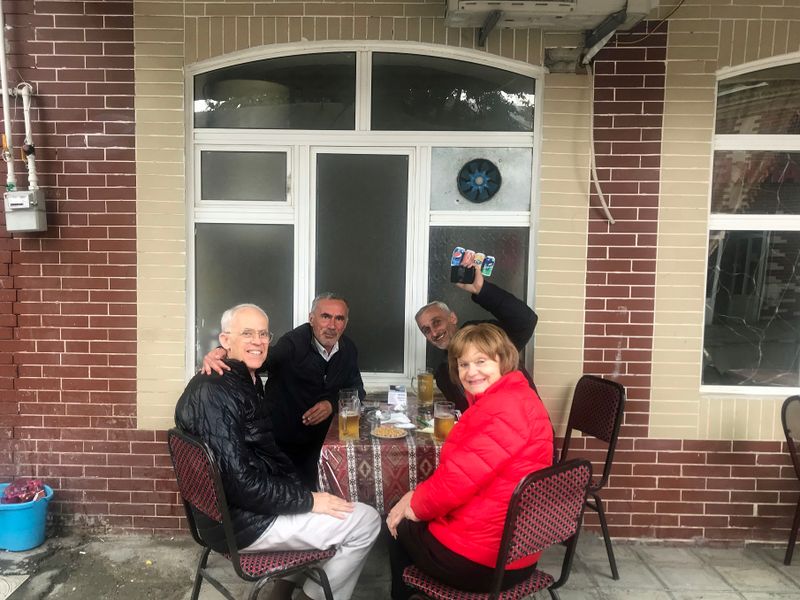 085 Then we had to have some plov and beer with the people who led us to the barber.jpg