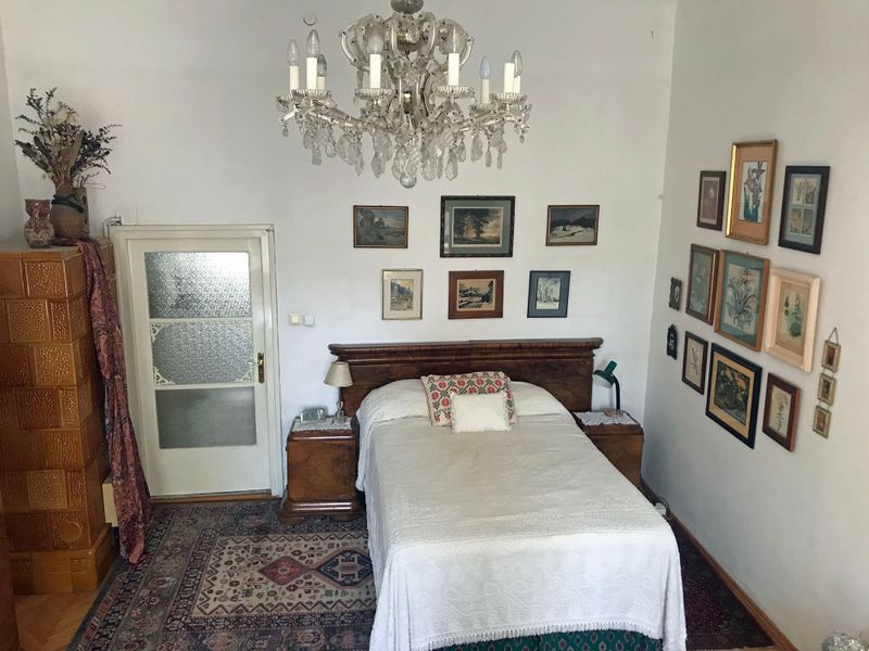 03 Bed and Antique Chandelier.jpg