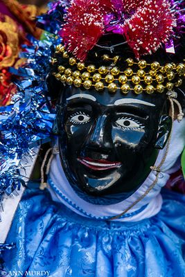Negrito dancer with gold beads