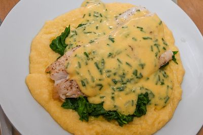 Smoked Haddock with Spinach, Polenta and Hollandaise Sauce.