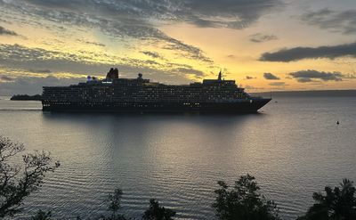 Queen Elizabeth departing Port Vila, Vanuatu, from Iririki Resort