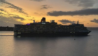 Queen Elizabeth departing Port Vila, Vanuatu, from Iririki Resort