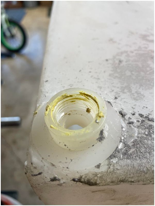 Threading in the fitting to far will break it away from the tank!