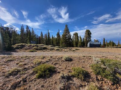 Entrances to Log Cabin Camp (L) and Mine (R)