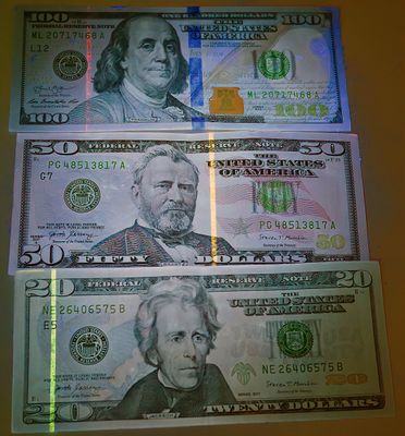 UV Security bands On US Currency
