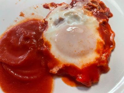 Egg on tomato sauce
