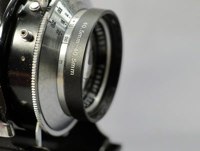 Coupling on Lens