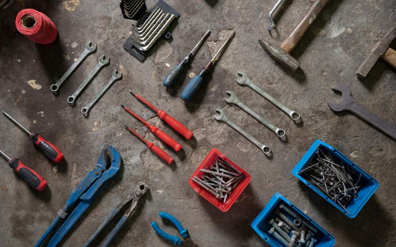 mechanic-supplies-composition-top-view-1.jpg