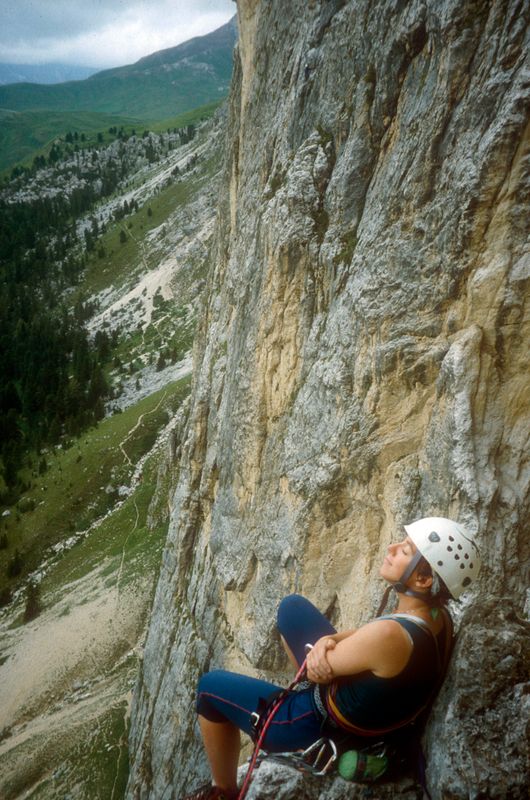 Dolomites Piz Ciavazes (Sella towers) Martina resting on belay ledge!