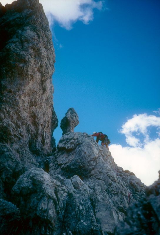 Dolomites Tofana south arete Martina climbing to the top 'mushroom'
