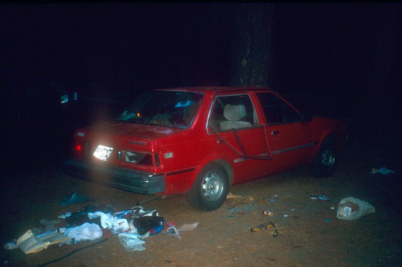 Yosemite campsite carpark - bear damaged car- you were not spposed to leave food in the car...