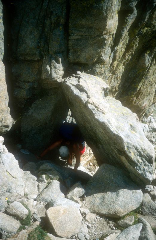 Corsica GR20 Day 9 Martina squeezing through hole on way to Refuge Manganu