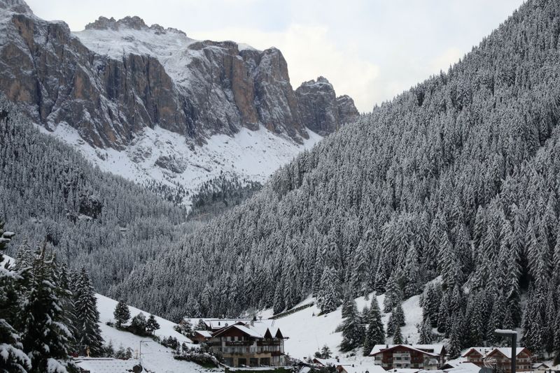 View of the Sella mountain group, from Selva on a snowy Autumn day