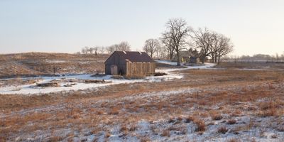 Yellow Farmhouse and Barn