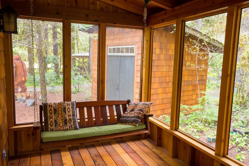 screened porch with low wall