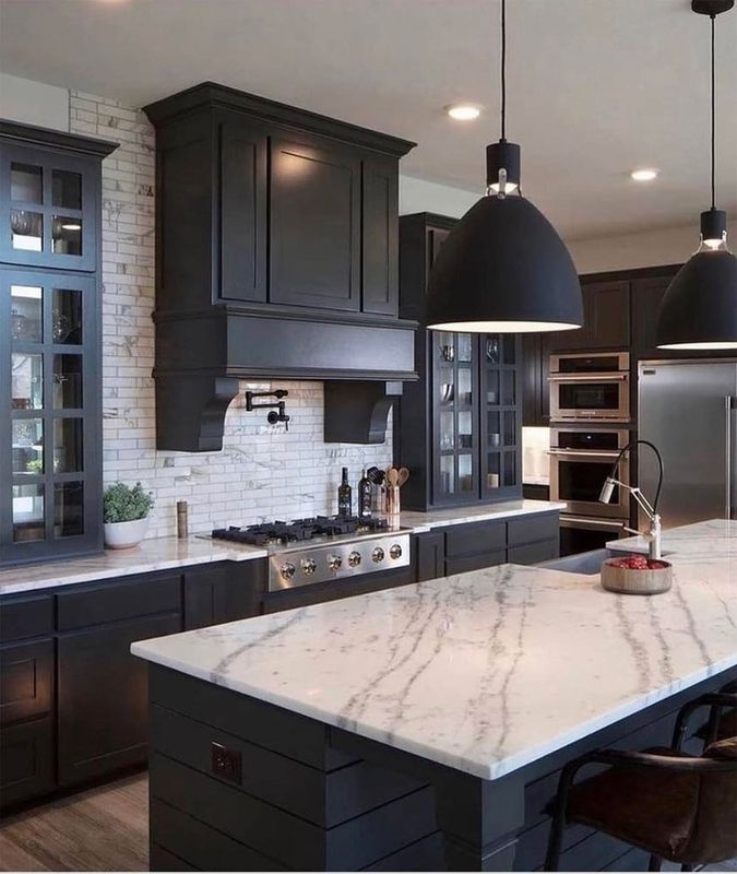 Dark cabinets light counter marble subway.jpg