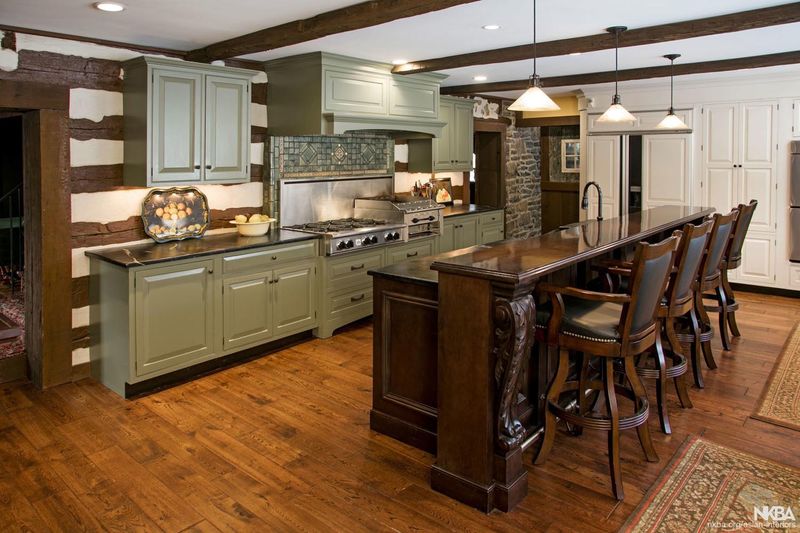 green cabinets dk brown island black counter.jpeg
