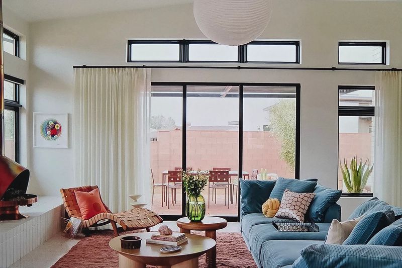 blue sofa with orange.jpg