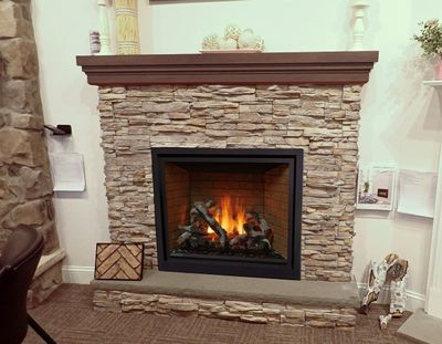 fireplace simulation stacked stone and darkened mantle.jpg