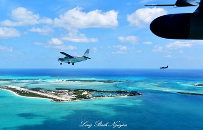 Flight of 3 Kodiak 100 over Norman's Cay, Norman's Cay Marina, Wax Cay, Boot Cay, Exuma, The Bahamas 202