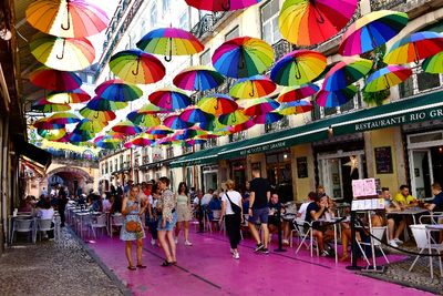 Tourists and Umbrellas at Pink Street, Lisbon, Portugal 057