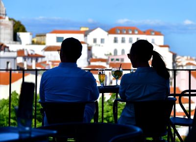 Enjoying the view from Kiosk of the Sun Doors, at Largo Portas do Sol, Lisbon Portugal 562