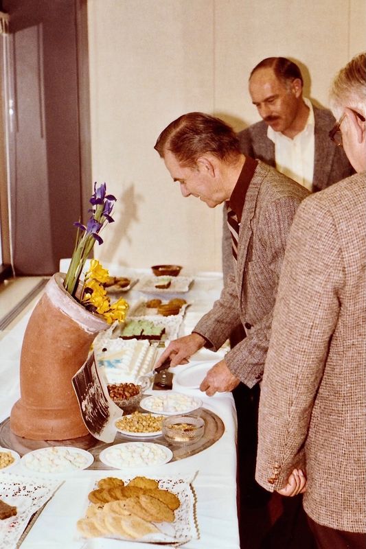 140) Ray's Retirement party. Is that a sewer pipe holding the flowers?
