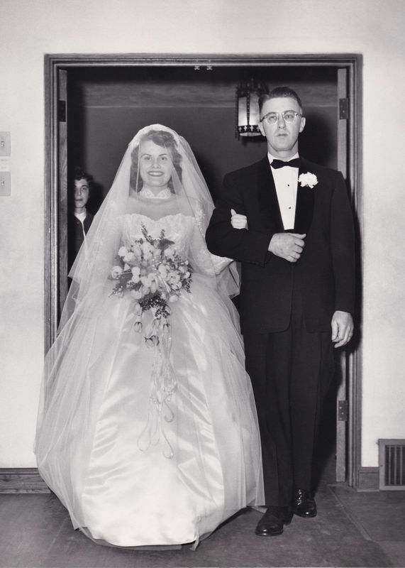 167) Thelma and her father Bertil Estlund walk down the isle.