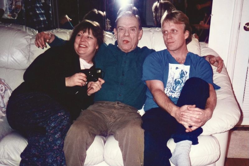 402) Katie, Dad and Dan at Mom's house.