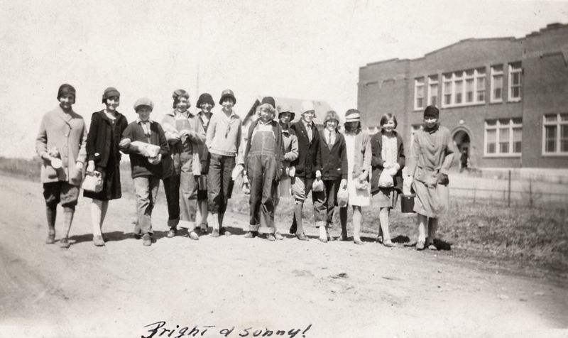 6) Ellen outside of school. Second from rt.?