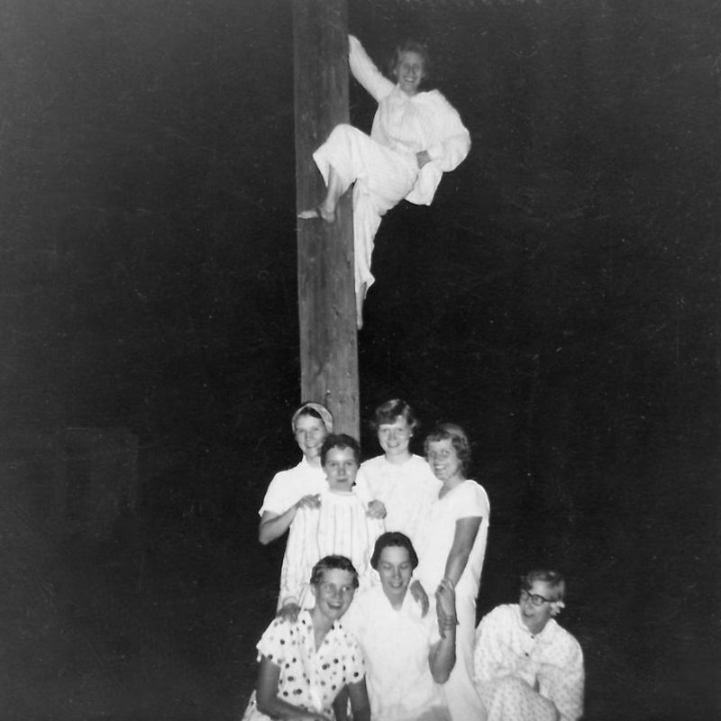 245) Climbing the phone pole. That's Emily on top!