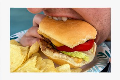 Puul's Burger and a person.