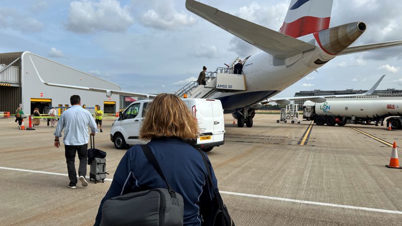 Walking to our British Airways Embraer 190