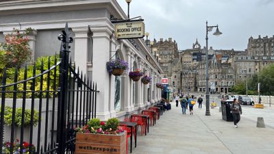 Arrive at Edinburgh Waverley Railway Station