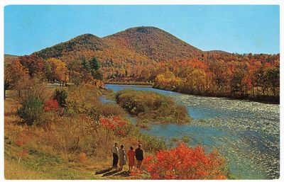 The Deerfield River adds a shimmering note to the glorious autumn splendor along the Famous Mohawk Trail.