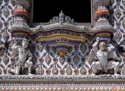Wat Pariwas Ubosot Supporting Demons (DTHB2648)