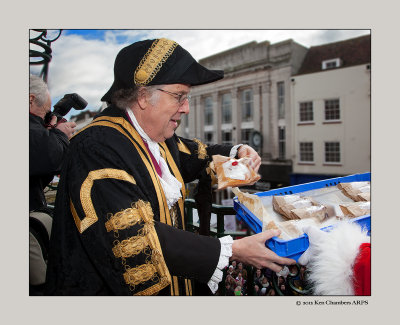 The Mayor of Colchester carries on the tradition of Bun Hurling