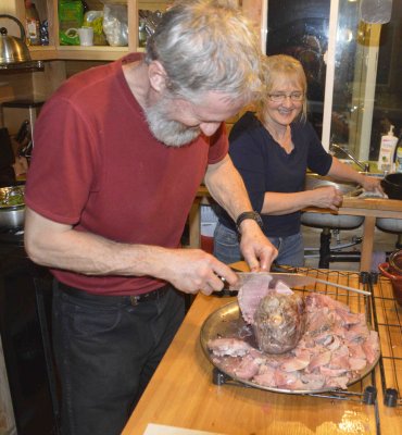 Hut owners Shelly and Martin and the leg of lamb.jpg
