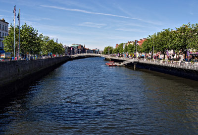 Looking west from the O'Connell Bridge.  The Ha'penney bridge is in the distance.