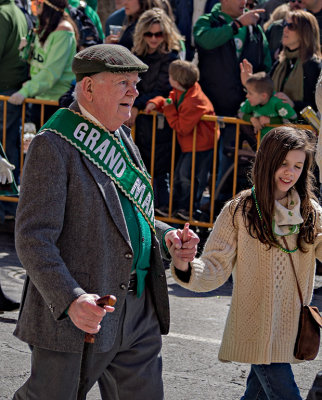 Grand Marshall from a previous year. With granddaughter?