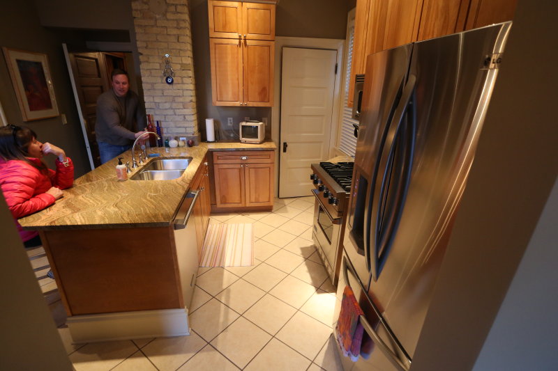 kitchen from patio room - door to basement on right