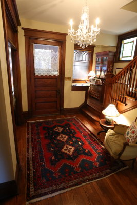 Foyer facing front door from kitchen