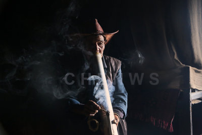 Man smoking, QingKou village