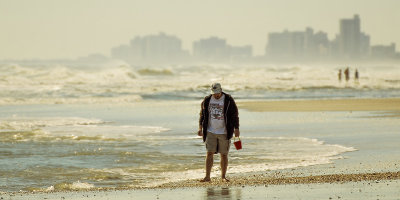 Beachcomber with Red Pail