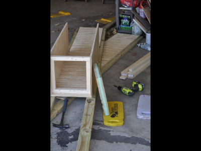 I used 1 5/8 exterior decking screws to attach the T1-11 siding pieces to each other and to the 2x4x12' treated lumber legs.  I cut 2x2 pieces to fit inside the bottom edges of the T1-11 sides.  These strips were used to attach the bottom predator guard and also helped square the tower.