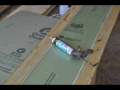I used a latex-silicone caulk to seal the edges--to improve the insulation and hold the piece in place.