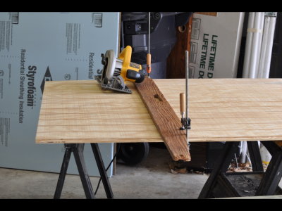I used a straight-edge to guide the circular saw and get straight cuts.   