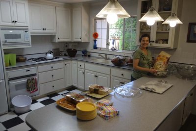 Cyn arranges appetizers