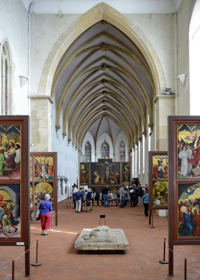 ... but the most interesting is the Isenheim Altarpiece. This is sevreal pieces of art. Check http://www.musee-unterlinden.com/isenheim-altarpiece.html .